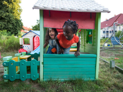 kids having fun in a playhouse